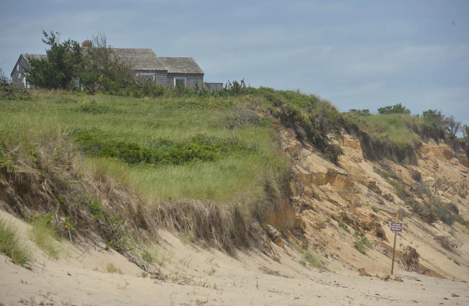 This erosion threatened home above Coast Guard Beach in Eastham may have played a role in the Watergate scandal.