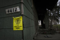 A burnt out abandoned house as a tax foreclosure notice posted on the front in Detroit, December 17, 2011. REUTERS/Mark Blinch