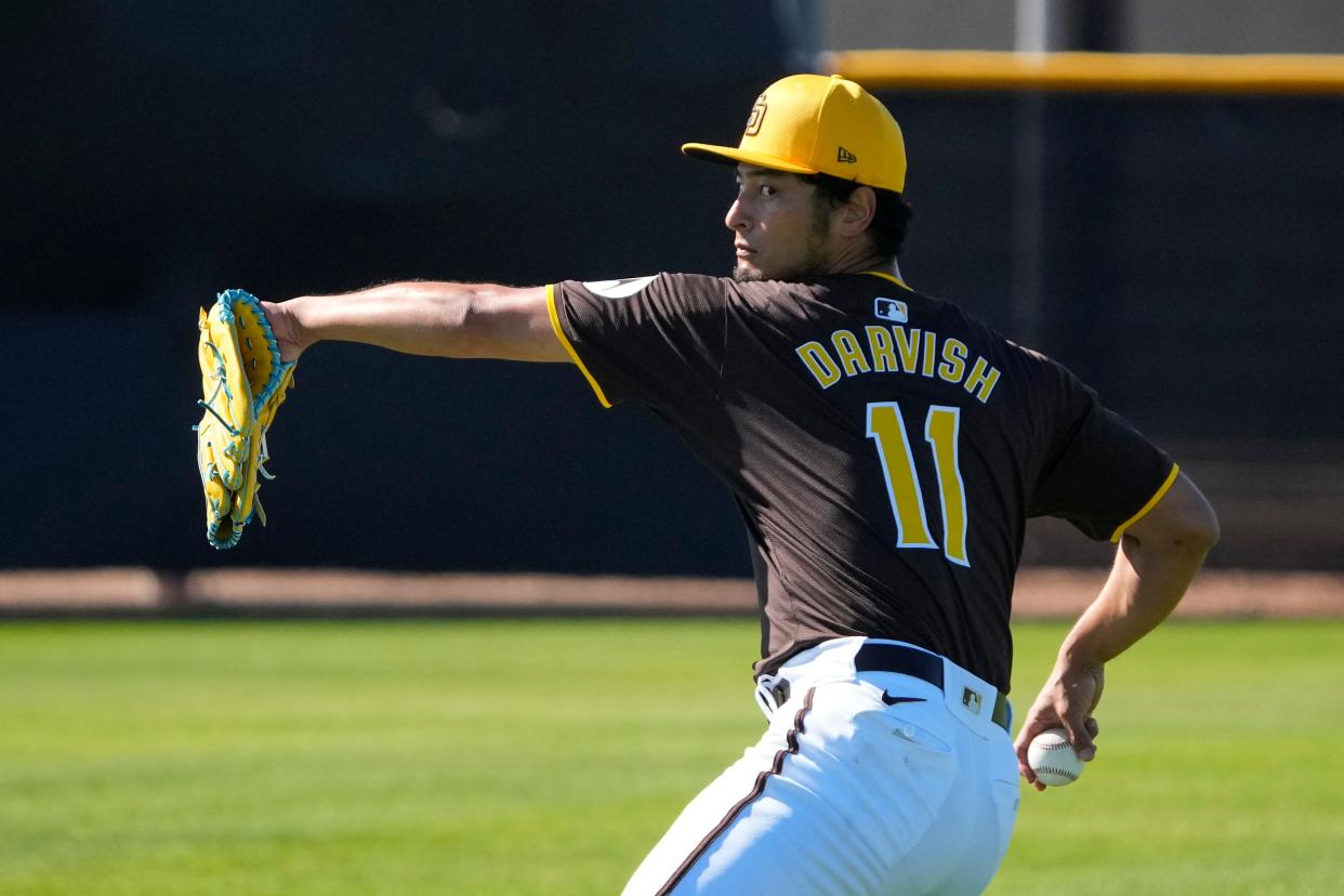 Feb 11: Padres starting pitcher Yu Darvish warms up at Peoria Sports Complex.