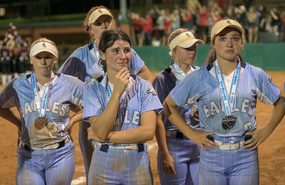South Lake players are overcome with emotion after falling to Middleburg Friday in the Class 5A state championship game at Legends Way Ball Fields in Clermont.