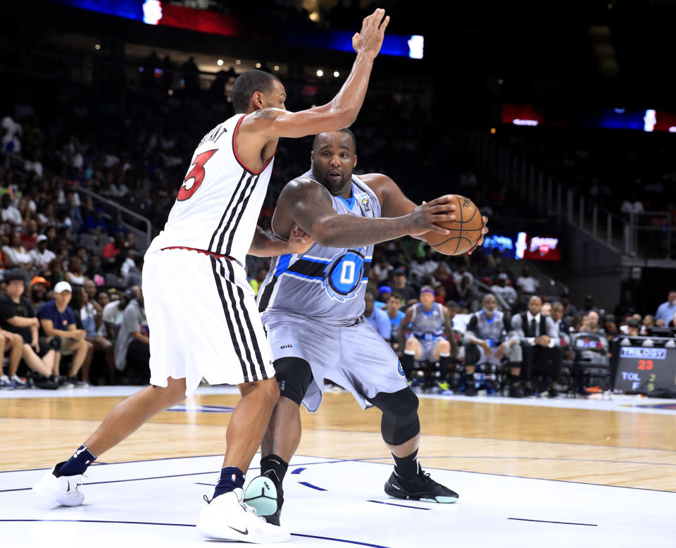 ATLANTA, GEORGIA - JULY 07: Glen Davis #0 of Power plays against Patrick O’Bryant #13 of Trilogy during week three of the BIG3 three on three basketball league at State Farm Arena on July 07, 2019 in Atlanta, Georgia. (Photo by Andy Lyons/BIG3/Getty Images)