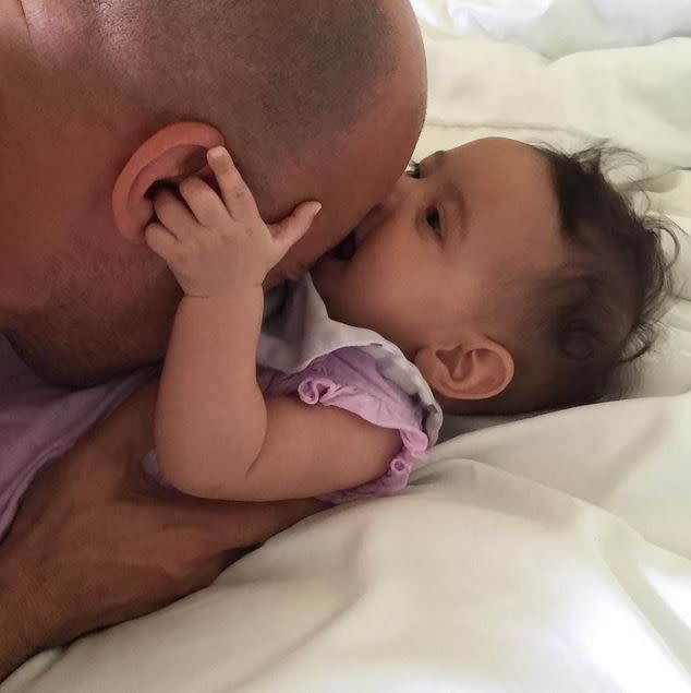 Vin Diesel may appear to be your typical macho man, but the actor proved he's a real softie when he shared this moving photo of himself planting a kiss on his adorable daughter Pauline Sinclair, who he named after his late "Fast & Furious" co-star Paul Walker. "All love.." the new dad captioned the snap on Aug.. 11, 2015.