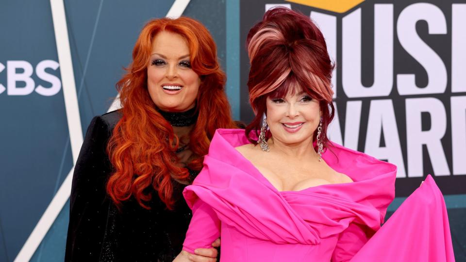 NASHVILLE, TENNESSEE - APRIL 11: (L-R) Wynonna Judd and Naomi Judd attend the 2022 CMT Music Awards at Nashville Municipal Auditorium on April 11, 2022 in Nashville, Tennessee. (Photo by Jason Kempin/Getty Images for CMT)