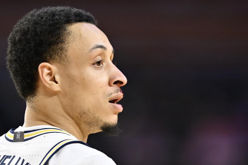 Jaelin Llewellyn of the Michigan Wolverines bleeds from his nose against the Rutgers Scarlet Knights during the second half at Crisler Center on Saturday, Feb. 3 in Ann Arbor, Michigan.