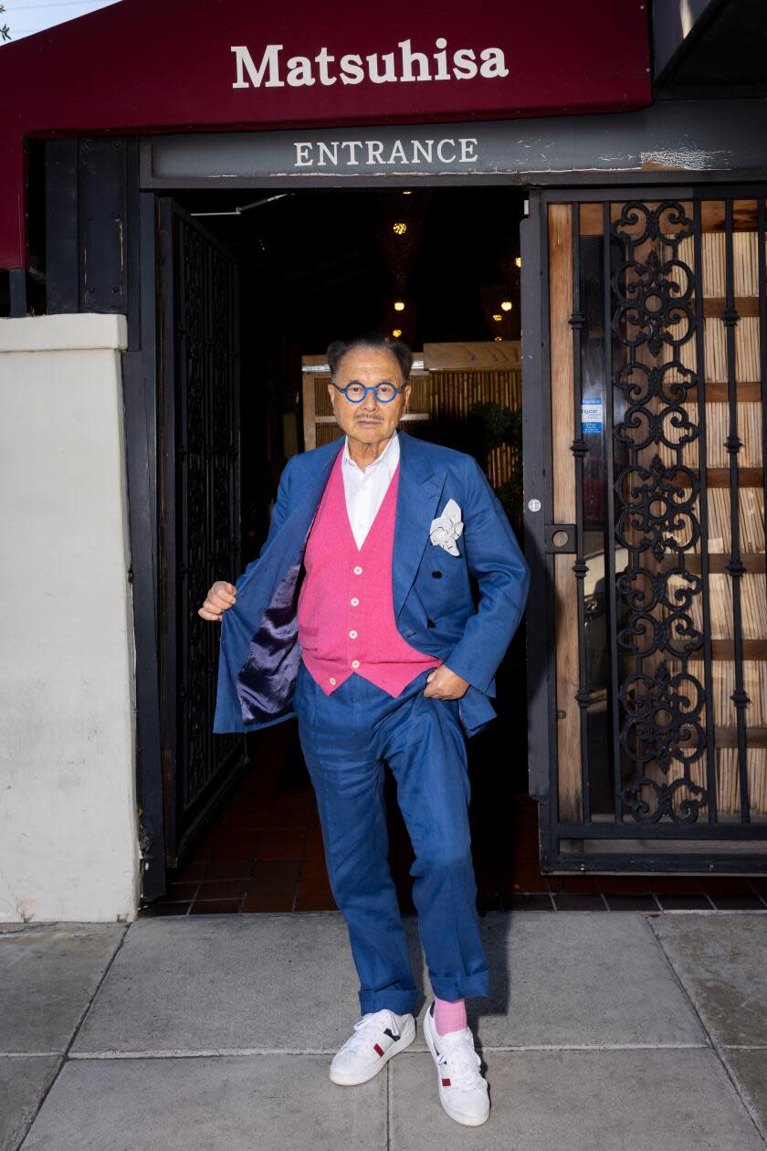 Mr. Chow shows off his outfit outside Matsuhisa in Beverly Hills. 