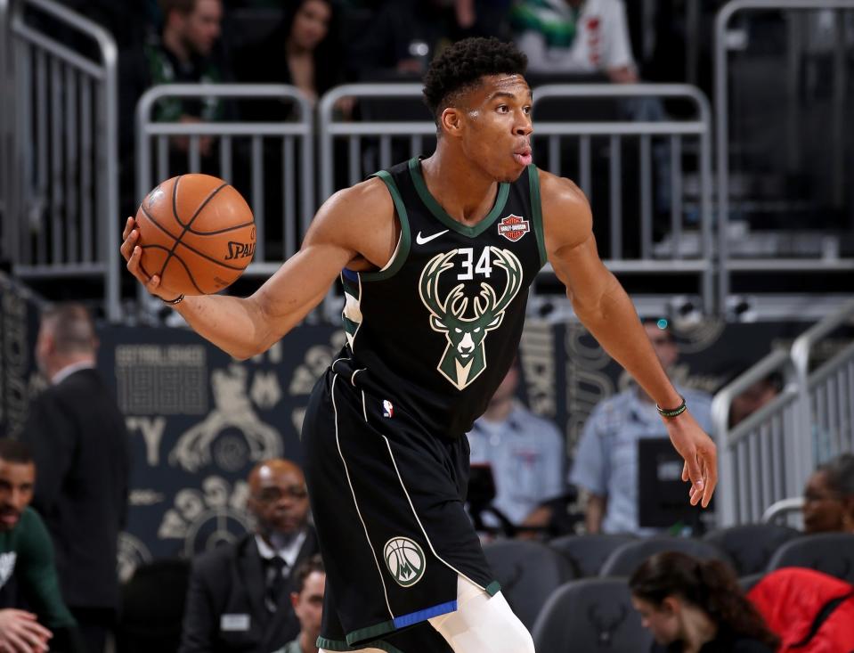 Giannis Antetokounmpo tallied 30 points and 13 rebounds and came up with the play of the game on defense in a win over the Celtics. (Getty)