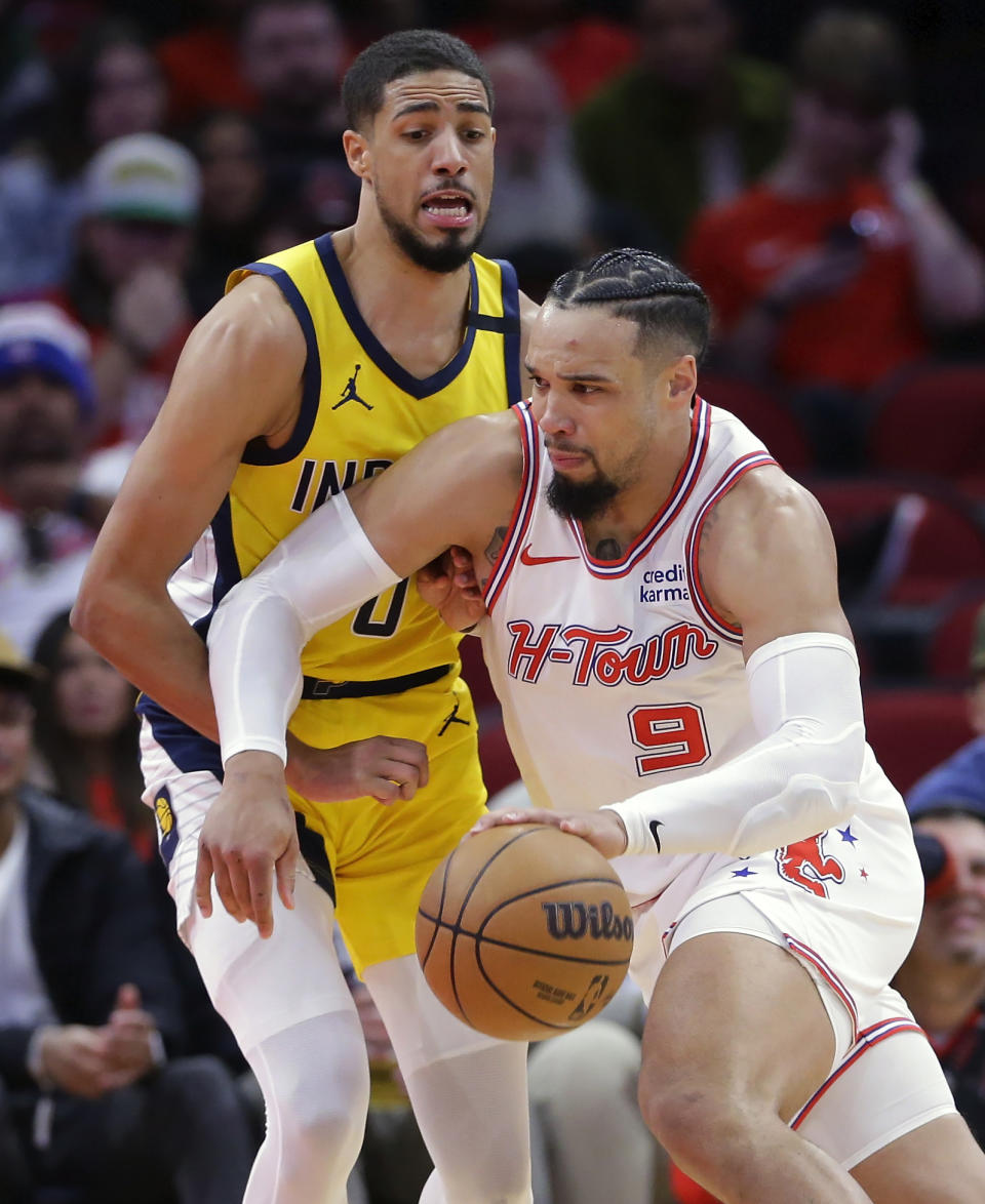 Houston Rockets forward Dillon Brooks (9) drives against Indiana Pacers guard Tyrese Haliburton during the first half of an NBA basketball game Tuesday, Dec. 26, 2023, in Houston. (AP Photo/Michael Wyke)