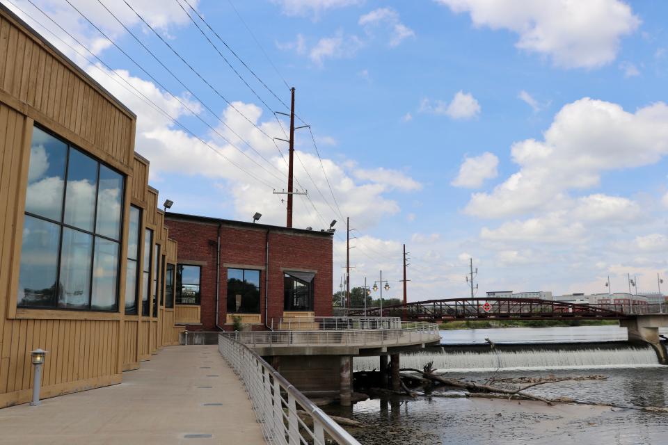 The rear patio of the Iowa River Power Restaurant, along the Iowa River, is seen on Friday, Aug. 4. The restaurant will close at the end of November as the building owner, Randy Ward, looks to renovate and find a new tenant.
(Credit: Ryan Hansen/Iowa City Press-Citizen)