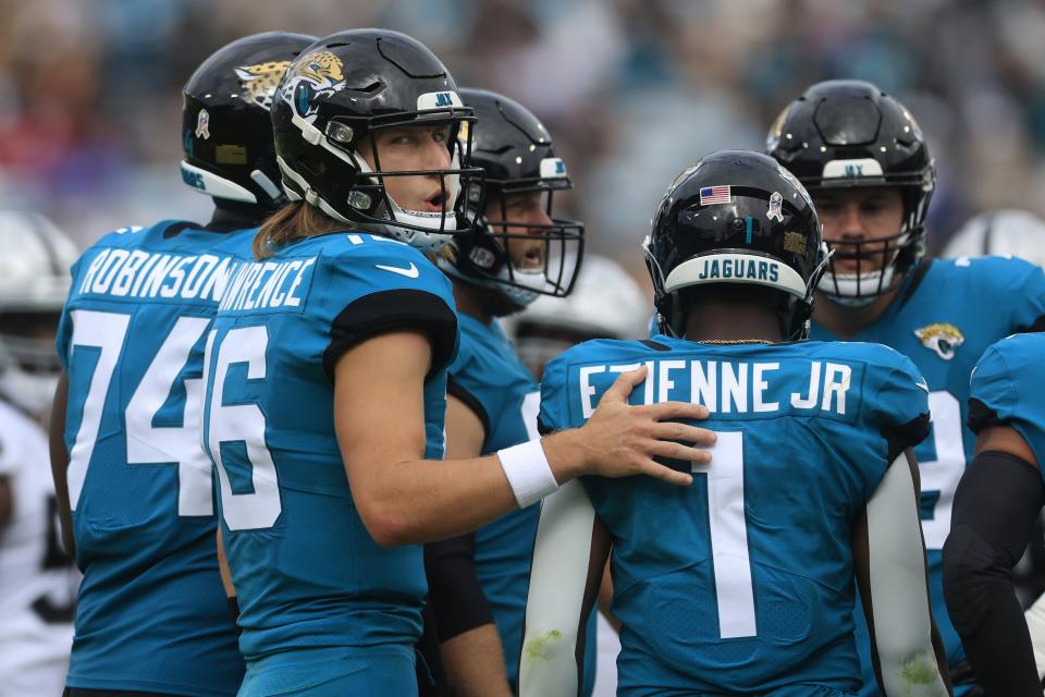 Jacksonville Jaguars quarterback Trevor Lawrence (16) calls a play in the huddle during the second quarter of a regular season NFL football matchup Sunday, Nov. 6, 2022 at TIAA Bank Field in Jacksonville. The Jacksonville Jaguars held off the Las Vegas Raiders 27-20. [Corey Perrine/Florida Times-Union]