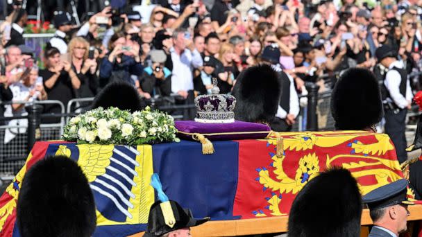 PHOTO: The coffin carrying Queen Elizabeth II makes its way along The Mall during the procession for the Lying-in State of Queen Elizabeth II on Sept. 14, 2022 in London. (Leon Neal/Getty Images)