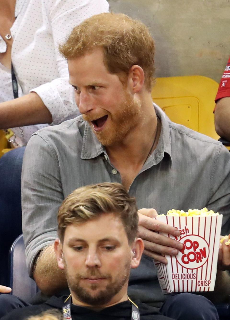 Prince Harry making a baby laugh