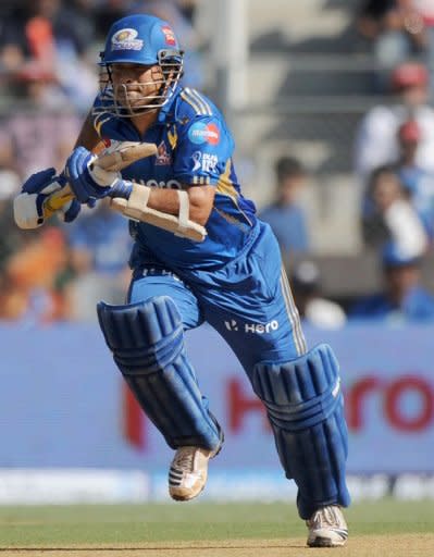 Sachin Tendulkar during the IPL Twenty20 cricket match between Mumbai Indians and Kings XI Punjab on April 22. He is the highest run-getter in both forms of the game and last month became the first batsman to complete 100 international centuries -- 51 in Tests and 49 in one-dayers