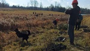 Josh Feltham, Fleming College Professor and Program Coordinator, oversees his Ecosystem Management student volunteers as they place and plant 600 trees in this farm creek’s newly restored and expanded riparian buffer.