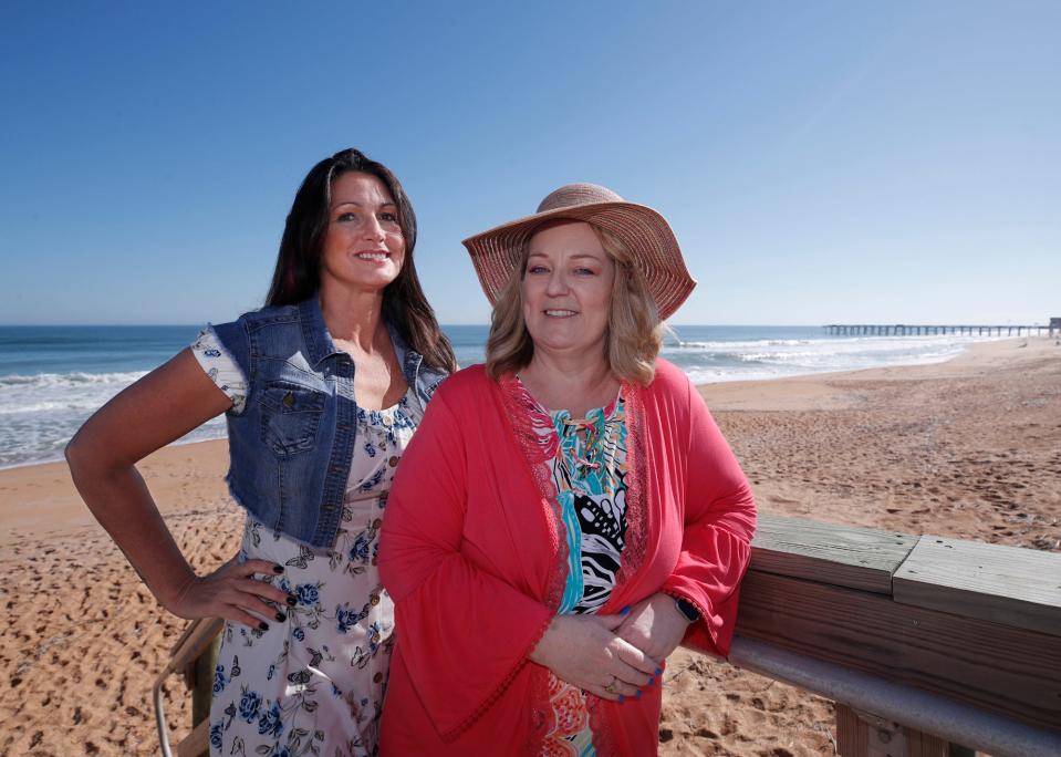 Tracy Miley, left, with her friend Dawn Fowler who she donated a kidney walk on Flagler Beach, Thursday, Dec. 8, 2022.