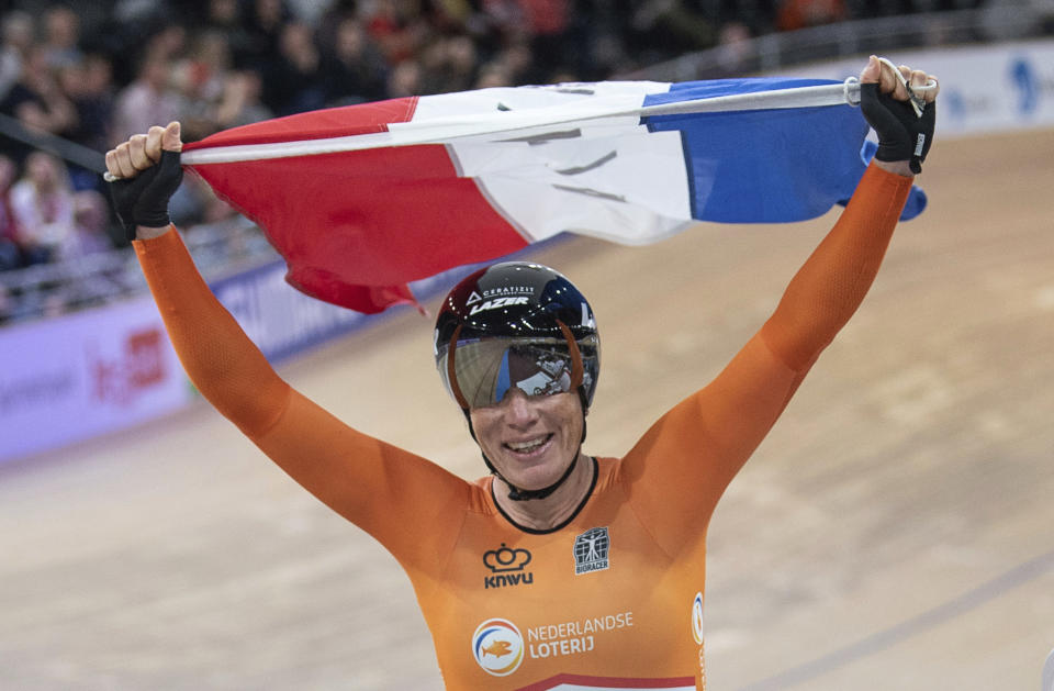 Kirsten Wild from the Netherlands celebrates her victory in the World Championships Scratch women's track cycle race in Berlin, Germany, Wednesday Feb. 26, 2020. (Sebastian Gollnow/dpa via AP)