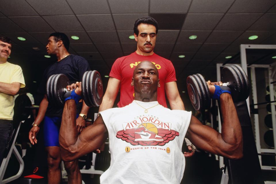Michael Jordan works out with Tim Grover in Chicago, circa 1991.