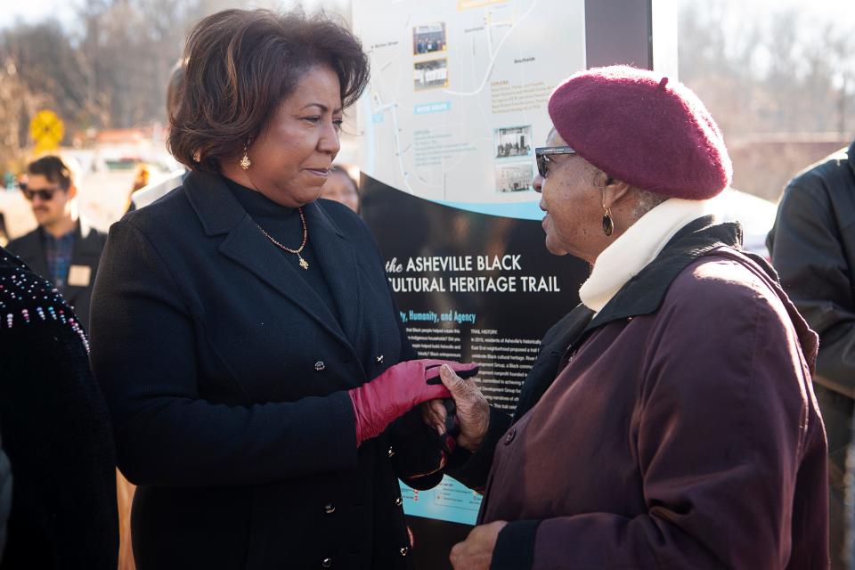 Vice Mayor Sandra Kilgore talks to Catherine Mitchell after the unveiling of a historical marker along the Asheville Black Cultural Heritage Trail in the River Arts District, December 15, 2023.