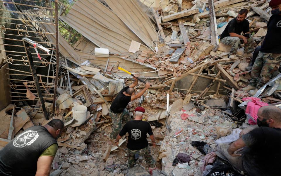 Lebanese soldiers search for survivors - AP Photo/Hassan Ammar