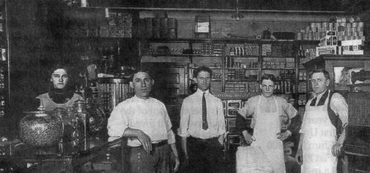 Plots & Ott’s Market is pictured in the 1910s. Pictured from left are Esther Kausler, Rudolph Plots, Douglas Meek, Elmer Schmidt and Ernie Ott. Casper Migliore later purchased the business and renamed it “Casper’s Market.” It was closed in the early 1970s and burned in 1974.