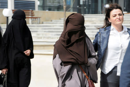 Women repatriated to Kosovo from Syria leave the Basic Court in Pristina, Kosovo, April 23, 2019. REUTERS/Laura Hasani