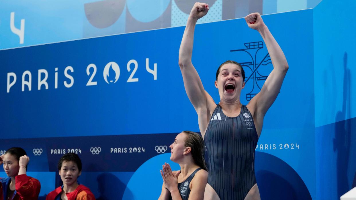 Britain's Andrea Spendolini Sirieix and Lois Toulson celebrate after winning the bronze medal in the women's synchronised 10m platform diving final at the 2024 Summer Olympics, Wednesday, July 31, 2024, in Saint-Denis, France. (AP Photo/Jin Lee Man)