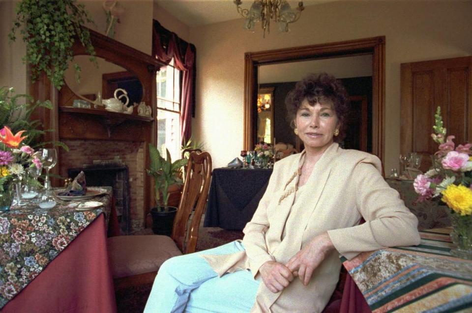 Ellen Davis sits in one of the dining areas of the McNinch House on May 2, 1994.