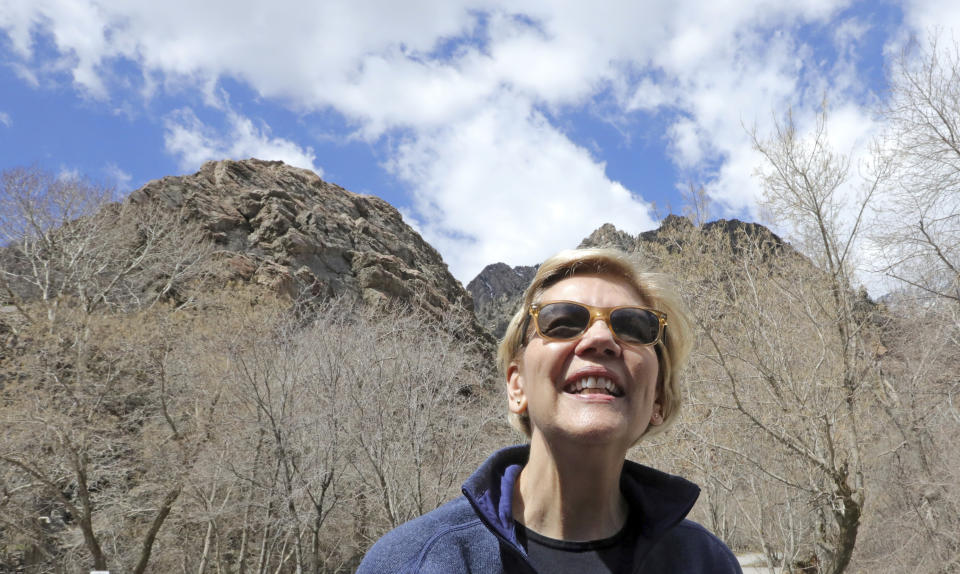 Democratic presidential candidate Sen. Elizabeth Warren, D-Mass., visits Big Cottonwood Canyon Wednesday, April 17, 2019, east of Salt Lake City. Warren is in Utah Wednesday after promising to restore broader public lands protections for two of the state's high-profile national monuments if elected president. It's a move that would not endear her to Utah's GOP establishment but could appeal to voters across the West angered by President Donald Trump's decision to shrink the monuments. (AP Photo/Rick Bowmer)