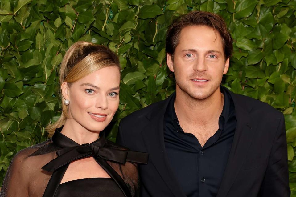 <p>Dia Dipasupil/WireImage</p> Margot Robbie and Tom Ackerly