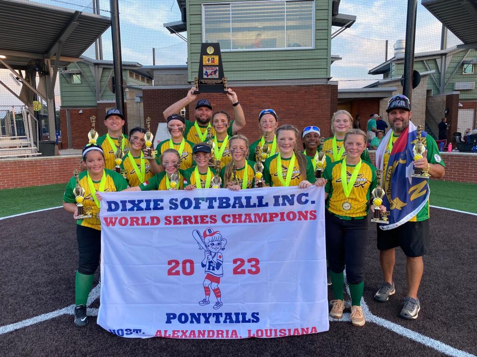 Bessemer City softball's 12-under all-star team celebrates following its win in the Ponytails division of the Dixie League Softball World Series on Aug. 1, 2023.