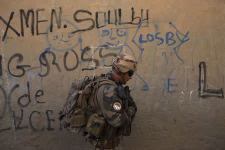 A French soldier from Operation Barkhane patrols in Timbuktu November 5, 2014. REUTERS/Joe Penney