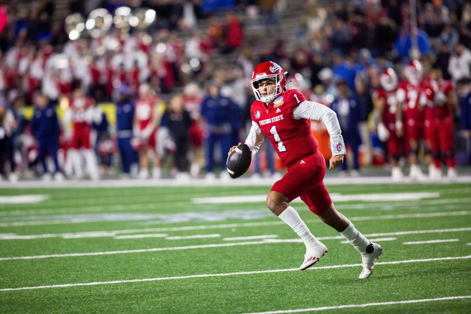 Fresno State quarterback Mikey Keene runs the ball during the Isleta New Mexico Bowl on Saturday, Dec. 16, 2023, at the University Stadium in Albuquerque.