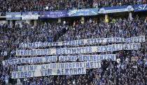 Hertha's supporters hold protest banner during the German Bundesliga soccer match between Hertha BSC Berlin and FC Bayern Munich in Berlin, Germany, Saturday, Nov. 5, 2022 against the Soccer World Cup in Qatar. Slogans read:'Air-conditioned stadiums instead of climate protection, persecution of certain sexualities, disregard of human rights, no freedom of speech, ban on alcohol'. (AP Photo/Michael Sohn)