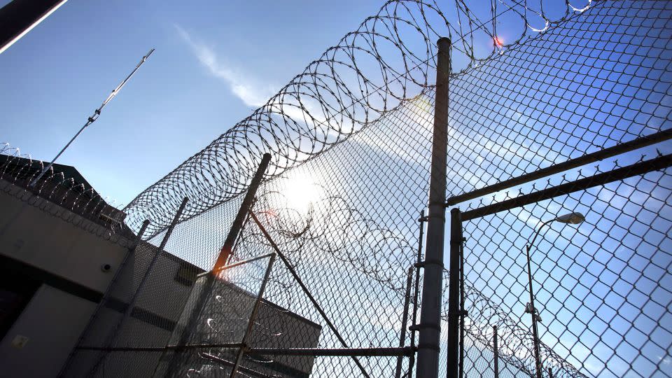 Razor wire tops the fencing at the Polunsky Unit prison in Livingston, Texas. - Bob Owen/Houston Chronicle/AP