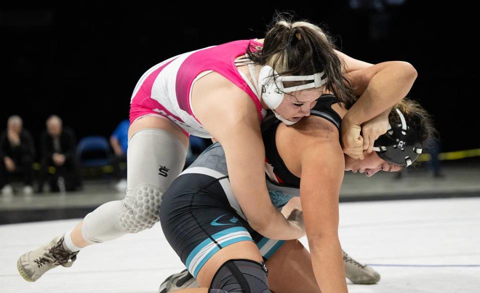 Gregori’s Mikayla Lancaster wraps up Chrystina Ballejos of Sheldon in the 170-pound title match during the Sac-Joaquin Section Masters Wrestling Championships at Stockton Arena in Stockton, Calif., Saturday, Feb. 17, 2024. Lancaster pinned Ballejos at 5:07 for the victory.