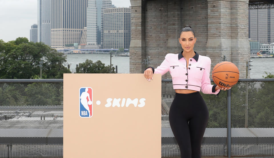 NEW YORK, NEW YORK - SEPTEMBER 28: Kim Kardashian poses at the announcement of SKIMS being named the official underwear partner of the NBA, WNBA, and USA Basketball on September 28, 2023 in New York City. (Photo by Dimitrios Kambouris/WireImage for SKIMS)