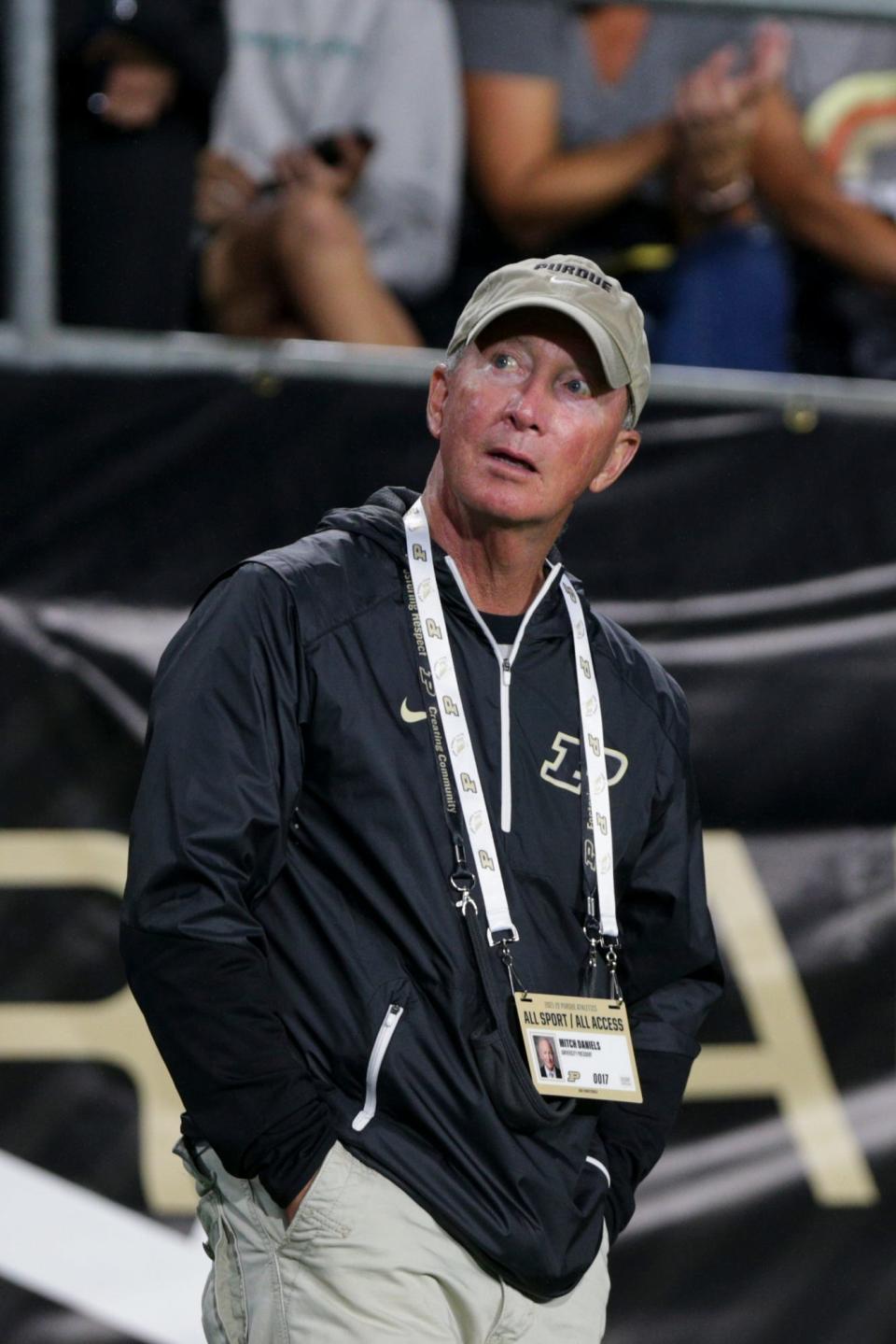 Purdue President Mitch Daniels watches the video board during the third quarter of an NCAA college football game, Saturday, Sept. 4, 2021 at Ross-Ade Stadium in West Lafayette.