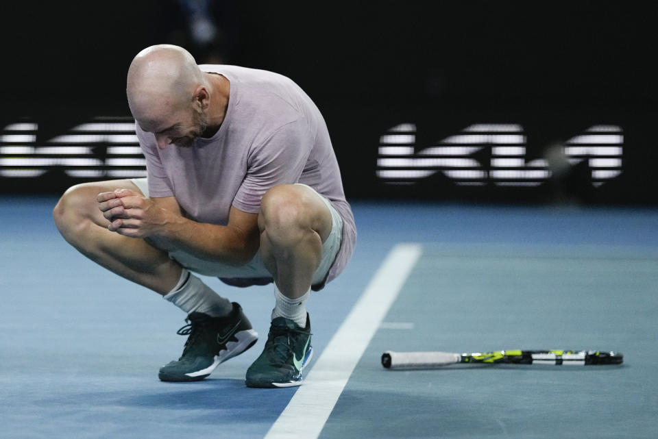 Adrian Mannarino of France reacts after defeating Ben Shelton of the U.S. in their third round match at the Australian Open tennis championships at Melbourne Park, Melbourne, Australia, Friday, Jan. 19, 2024. (AP Photo/Louise Delmotte)