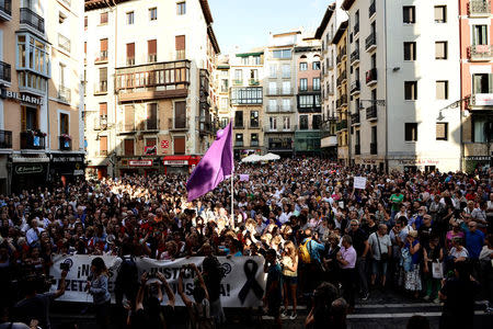 People protest the provisional release granted to five men cleared of the gang rape of a teenager and convicted of a lesser crime of sexual abuse in Pamplona, Spain, June 22, 2018. REUTERS/Vincent West