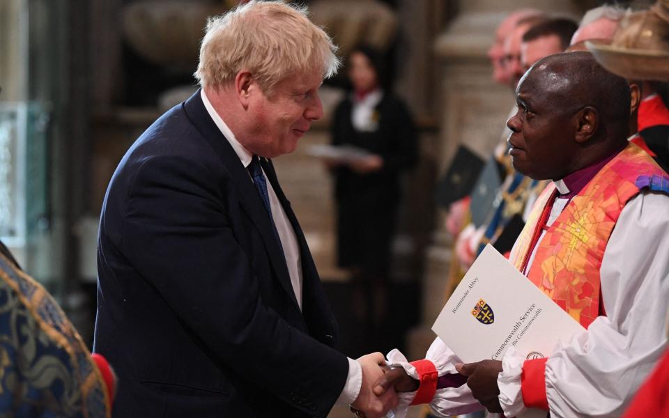 Boris Johnson shakes hands with Lord Sentamu - Daniel Leal/PA