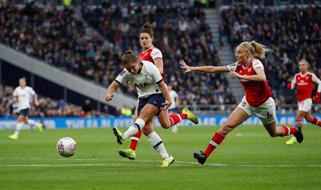 Tottenham Hotspur's Kit Graham in action with Arsenal's Leah Williamson Action Images via Reuters/Matthew Childs