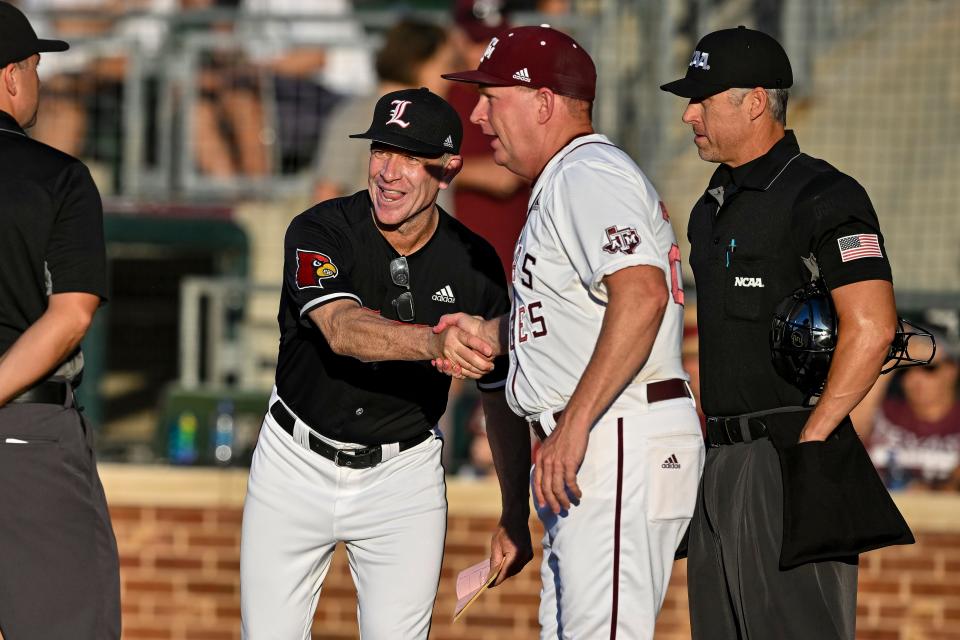 Jun 10, 2022; College Station, TX, USA; Louisville head coach Dan McDonnell and Texas A&M head coach Jim Schlossnagle exchange line up prior to game one of the super regional at Blue Bell Park.  Mandatory Credit: Maria Lysaker-USA TODAY Sports