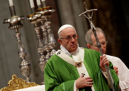 Pope Francis leads a special mass to mark International Migrants Day in Saint Peter's Basilica at the Vatican January 14, 2018. REUTERS/Max Rossi