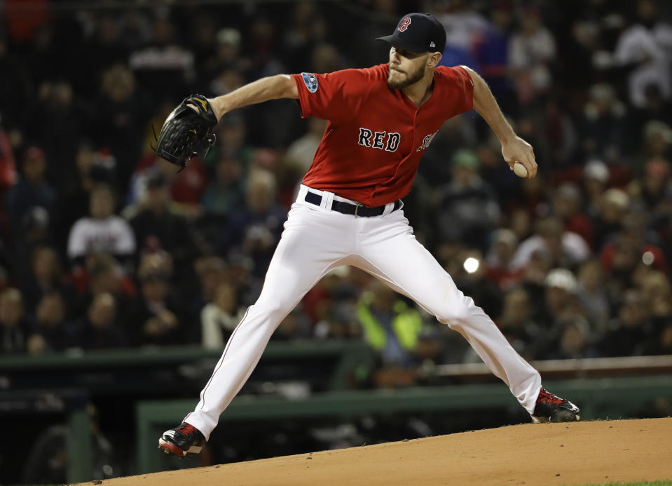 Boston Red Sox starting pitcher Chris Sale throws against the Houston Astros during the first inning in Game 1 of a baseball American League Championship Series on Saturday, Oct. 13, 2018, in Boston. (AP Photo/David J. Phillip)