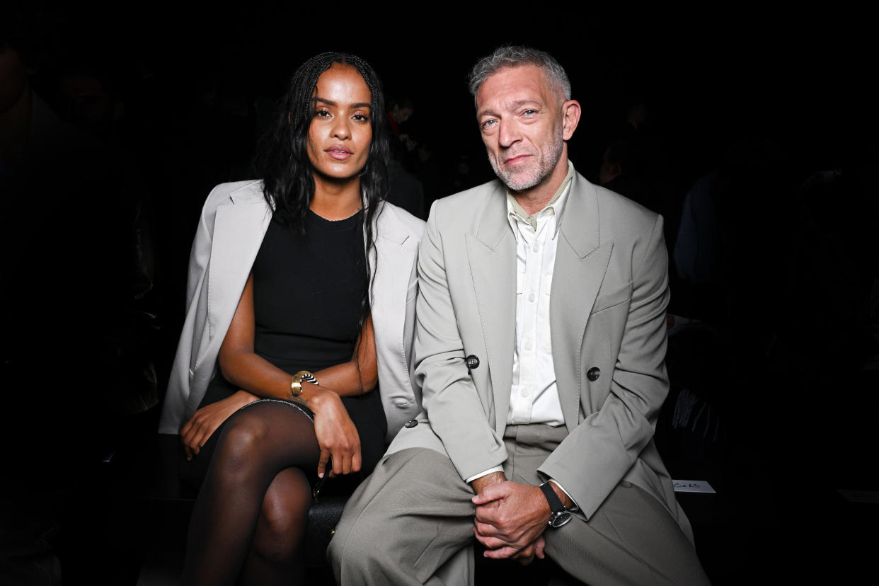 PARIS, FRANCE - JANUARY 18: (EDITORIAL USE ONLY - For Non-Editorial use please seek approval from Fashion House) Narah Baptista and Vincent Cassel attend the AMI - Alexandre Mattiussi Menswear Fall/Winter 2024-2025 show as part of Paris Fashion Week on January 18, 2024 in Paris, France. (Photo by Stephane Cardinale - Corbis/Corbis via Getty Images)