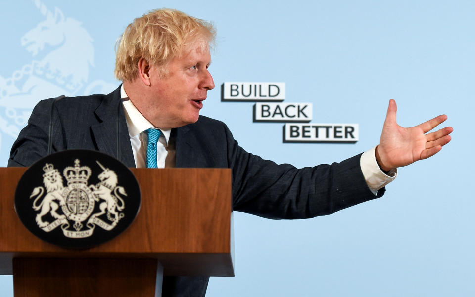 British Prime Minister Boris Johnson delivers a speech at Exeter College Construction Centre, part of Exeter College in Exeter, Britain September 29, 2020. Finnbarr Webster/Pool via REUTERS     TPX IMAGES OF THE DAY