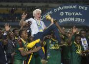 <p>LIBREVILLE, GABON – FEBRUARY 05: Cameroon Coach Hugo Broos celebrates winning the CAN 2017 FINAL between Egypt and Cameroon at Stade de L’Amitie on February 05, 2017 in Libreville, Gabon. (Photo by Visionhaus/Corbis via Getty Images) </p>