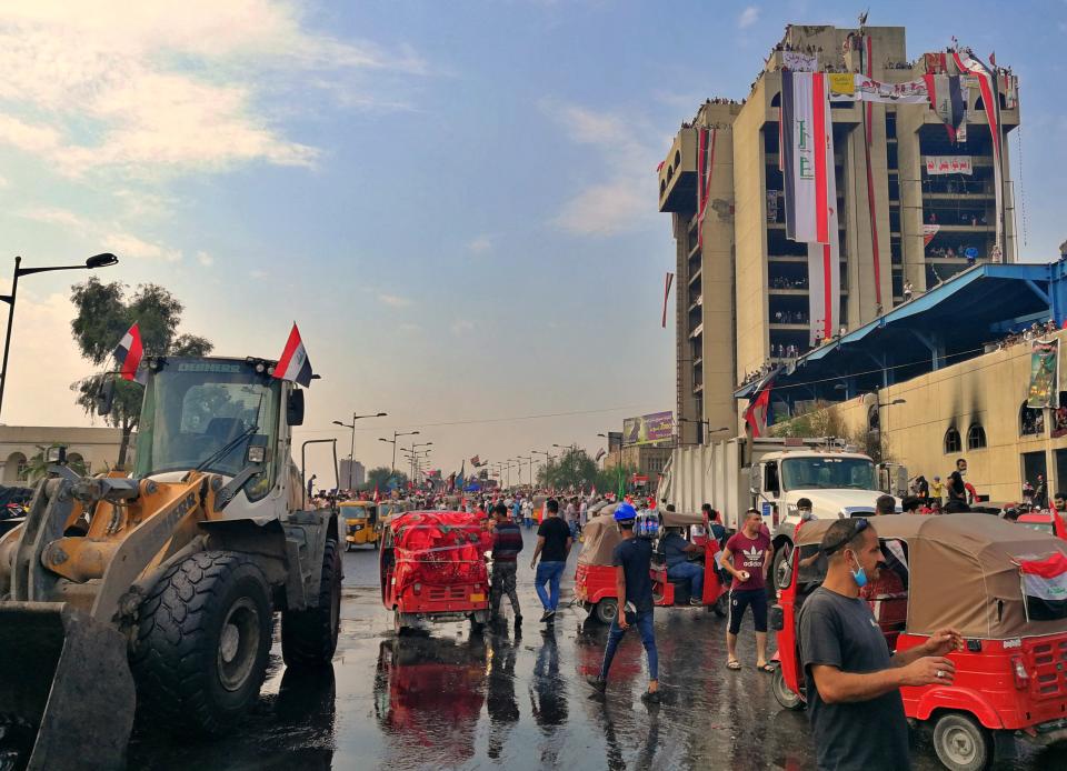 Anti-government protesters gather during ongoing protests in Baghdad, Iraq, Wednesday, Oct. 30, 2019. (AP Photo/Khalid Mohammed)