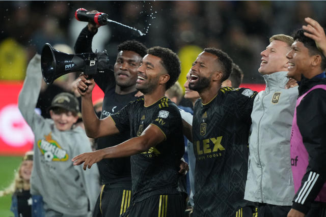 May 2, 2023; Los Angeles, CA, USA; LAFC midfielder Jose Cifuentes (20), midfielder Timothy Tillman (11), midfielder Kellyn Acosta (23) and midfielder Mateusz Bogusz (19) celebrate after the game against the Philadelphia Union BMO Stadium. Mandatory Credit: Kirby Lee-USA TODAY Sports