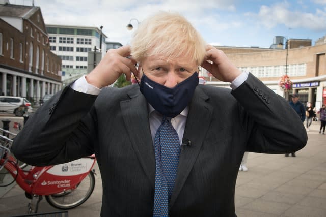 Prime Minister Boris Johnson meets shoppers and shopkeepers during a visit to his constituency in Uxbridge, west London 