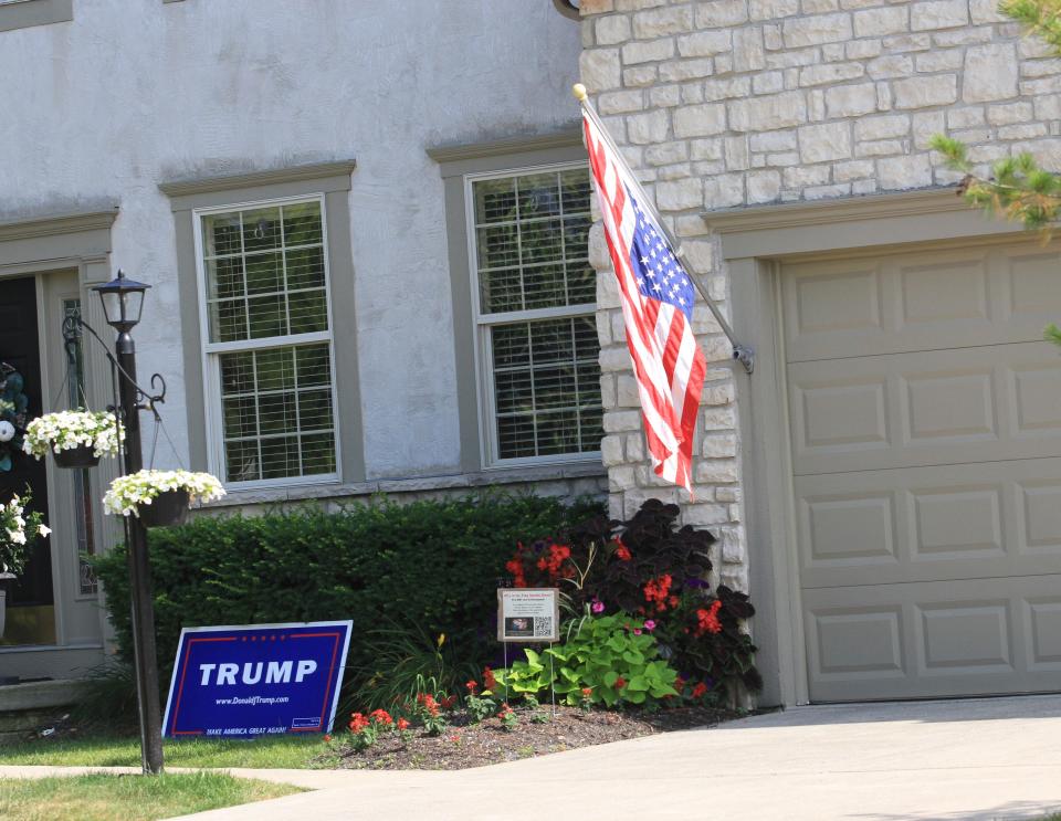 An upside-down American flag flies at the Etna Township residence of Rozland McKee on Thursday, June 20, 2024. She is a township trustee.